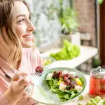 woman eating a salad