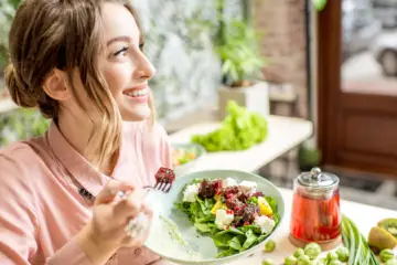 woman eating a salad