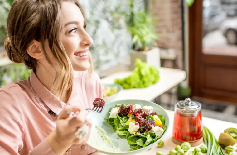 woman eating a salad