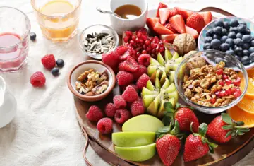 table full of fruit bowls