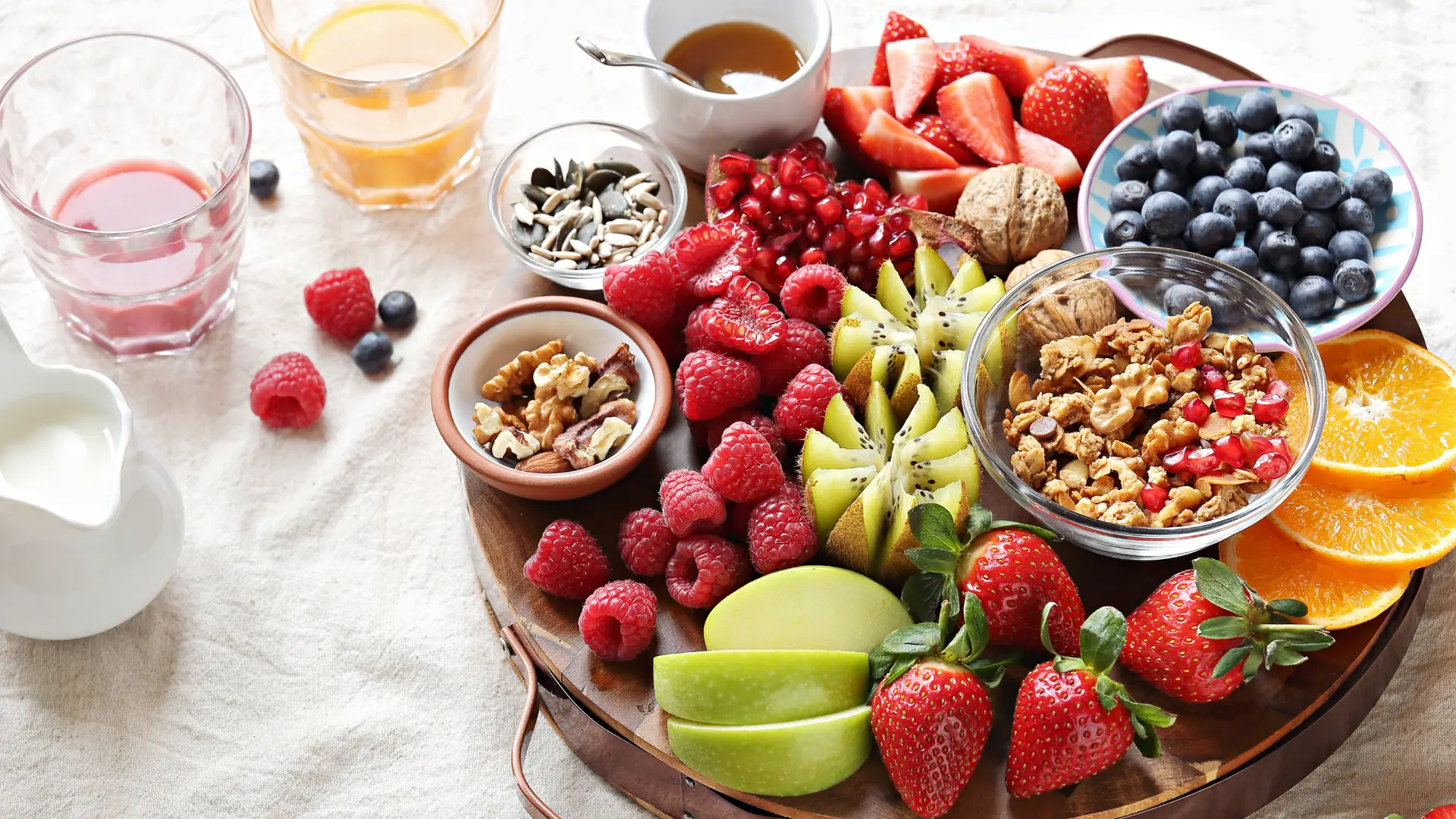 table full of fruit bowls