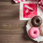 3 doughnuts on a table