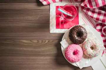 3 doughnuts on a table