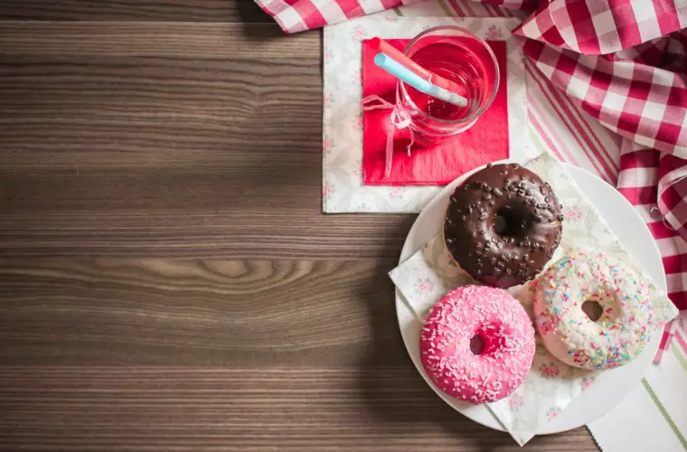 3 doughnuts on a table