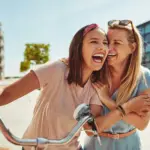 2 women laughing